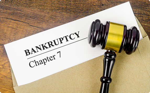 Chapter 7 bankruptcy document with gavel – Legal guidance on debt relief and financial options.